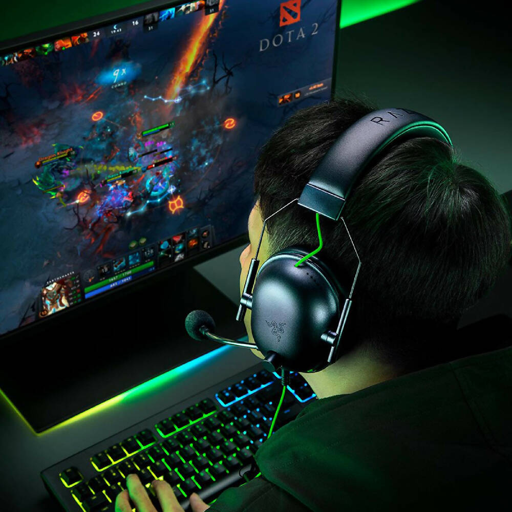 Razer Blackshark V2 X 7.1 Usb Headset Black being used by gamer